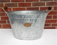Oval metal bucket. Great for storage. Wood