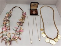Lot of costume jewelry necklaces ranging from 18"