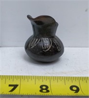 wonderful old carved mini pitcher