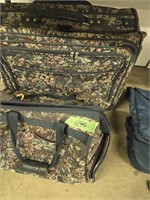 Suitcase carry bags located under table