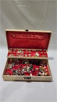 Estate jewelry box full of holiday jewelry