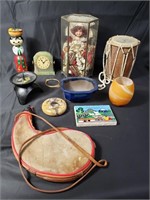 Group of miscellaneous items - doll, drum, canteen
