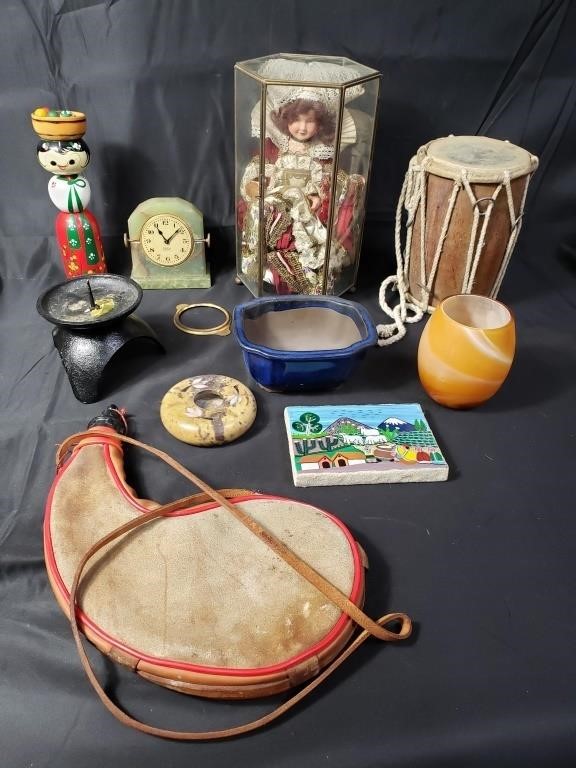 Group of miscellaneous items, doll, drum, canteen