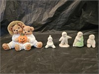 4 Bisque Hand Painted Snow Baby Figurines