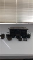 Lot of cast iron pots and kettles (stove sold