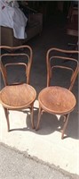 Antique circular wood seat chairs x 2. These are