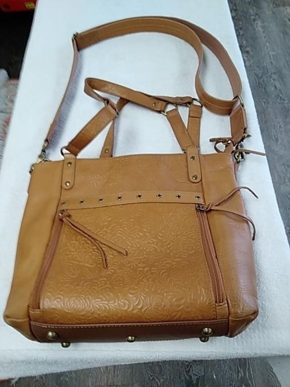 Gun tote 'n Mama's leather purse