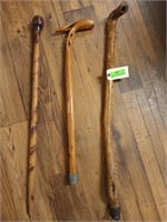 3 wooden walking canes