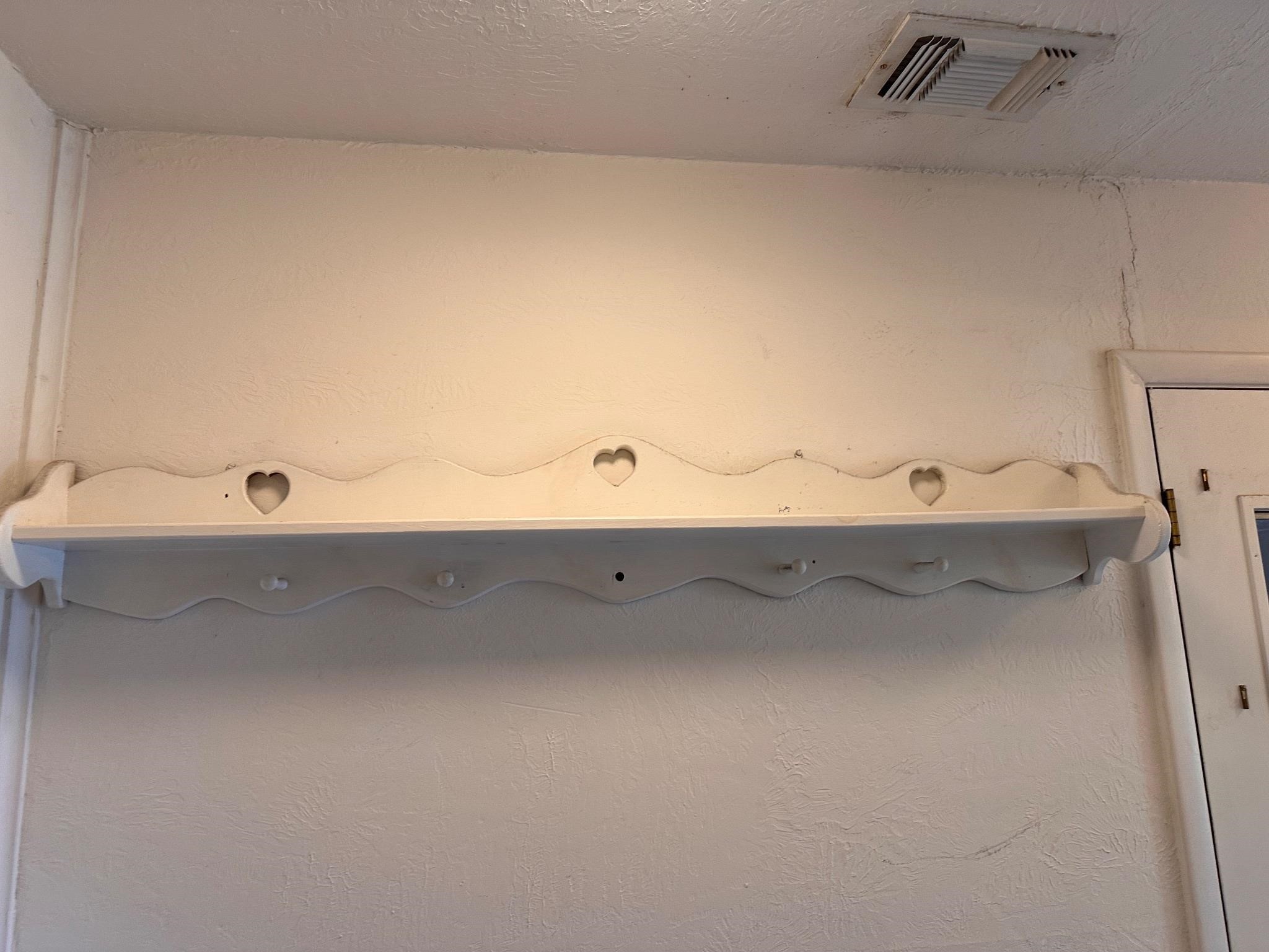 Large wooden wall shelf with heart design