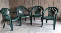 Four Green Plastic Outdoor Chairs