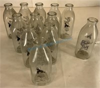 One dozen Cheyenne frontier days milk bottles