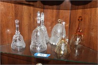 3RD shelf of corner cabinet , shelf of glass bells