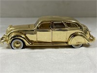 1936 gold Chrysler die-cast