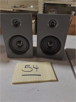Two stereo speakers, approx 9" tall