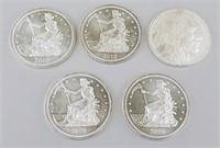 5 One Ounce Fine Silver Coins.