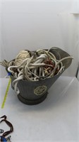 coal bucket with assorted ropes