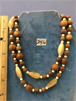 Horn, ivory bead, and wood necklace, 32"     (k 15