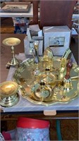 Polished brass items and others. Bookends, candle