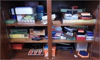 Entire cabinet full of board games, card games