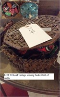 vintage sewing basket full of handcrafted items