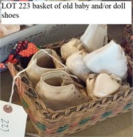 basket w old baby / doll shoes