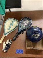 Wilson rackets and a bowling ball