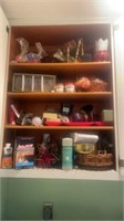 Cabinet full of candles, brass holders, meyers