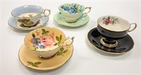 GROUP OF ASSORTED TEA CUPS AND SAUCERS