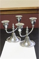 A Pair of Metal Candle Sticks
