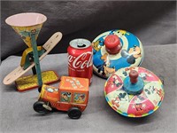 Vintage tin toys.  Walt Disney spin tops, tin toy