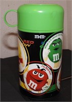 Green M&M Insulated Thermos ( A. Aronson)