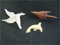 CARVED BROOCHES