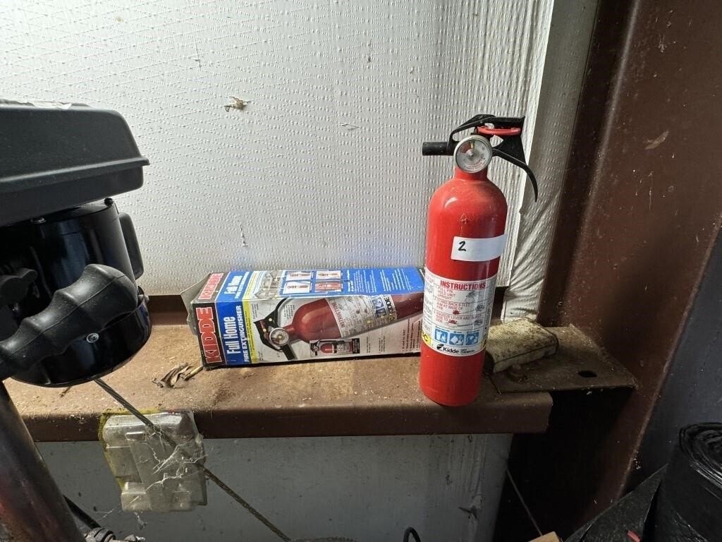 TWO FIRE EXTINGUISHERS