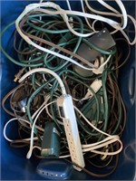 Two totes of extension cords and outlet strips