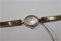 14k yellow gold Ladies Omega Watch - band by
