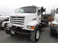 (MCW) 1997 FORD T/A ROLL-OFF TRUCK