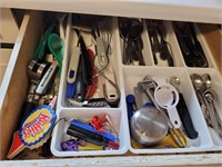 lot of cutlery, spoons, forks, knives, etc