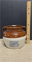 Bean pot with advertisement for Harmony Lumber Co.