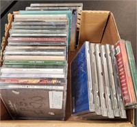 Mixed lot of a full box of CDs