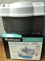 HOLMES HUMIDIFIER IN BOX. WORKS