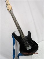 Yamaha ERG 121C guitar with shoulder strap and