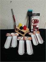 New shears, barbecue brush, barbecue lighter, a