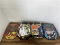 2 Pokémon tins w/ cards