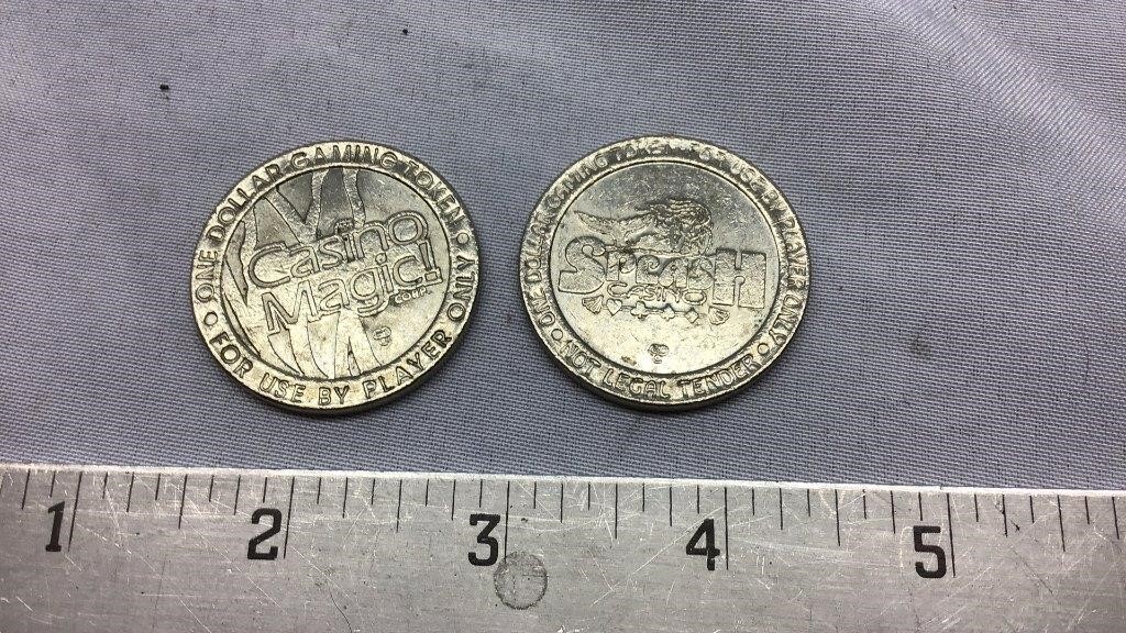 Of 2 vintage casino tokens, checkm out