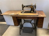 Singer Sewing machine. Cast iron stand. Works