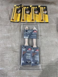 paint brushes and plastic package openers