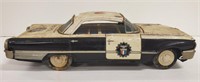 Police car tin toy, 9 1/2" L x 3 1/2" W