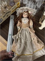 DOLL IN ROSE/LACE DRESS