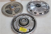 3 vintage hubcaps