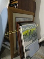 assorted picture frames pictures wood table top